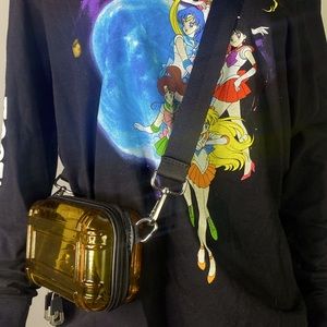 Hard shell cross body